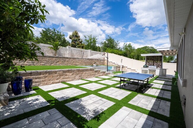 Building Photo - "Spacious 4-Bedroom Retreat with 3 Full Baths in Winter Garden's Serene Sanctuary"