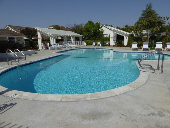 Building Photo - COMING SOON! Charming 2-Bedroom Home with a Versatile Loft in The Bungalows of Valencia!