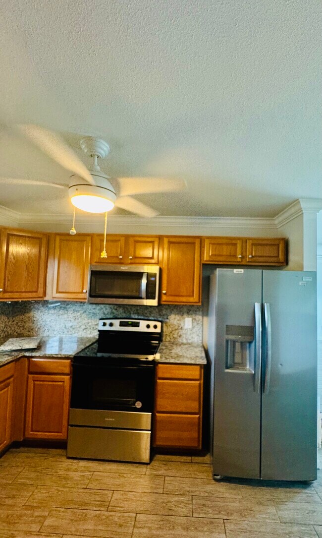 Building Photo - 1612 SE Cascella Ct