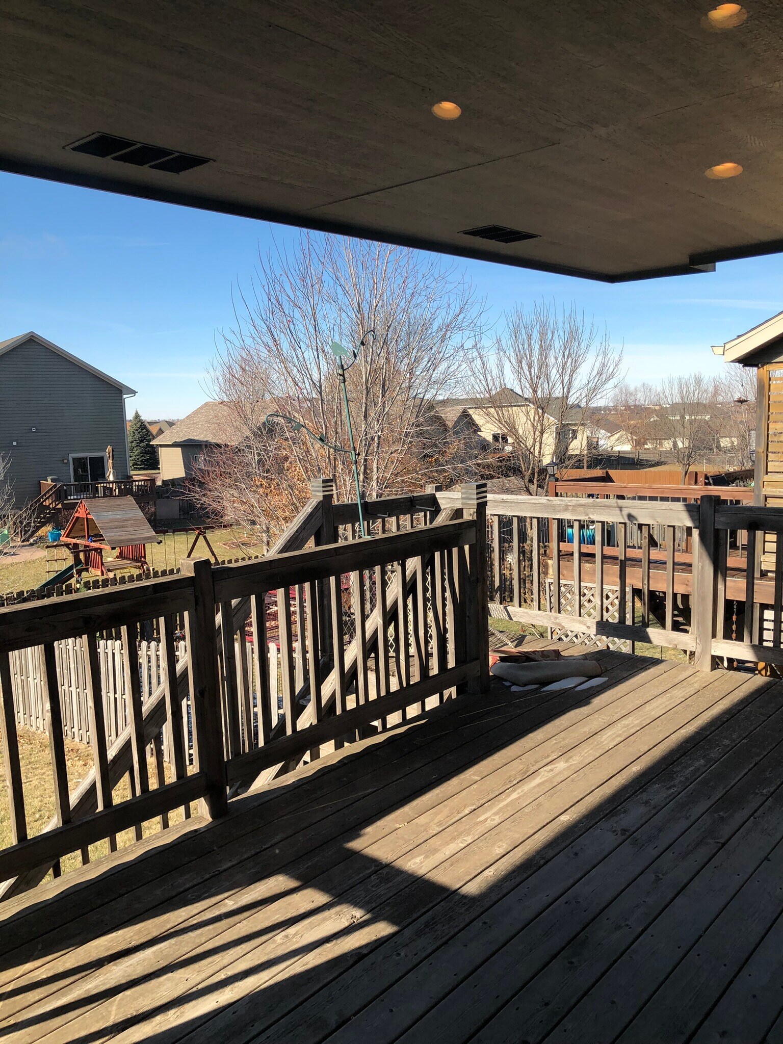 Lovely covered deck, with stairs to the yard. - 911 N Bahnson Ave