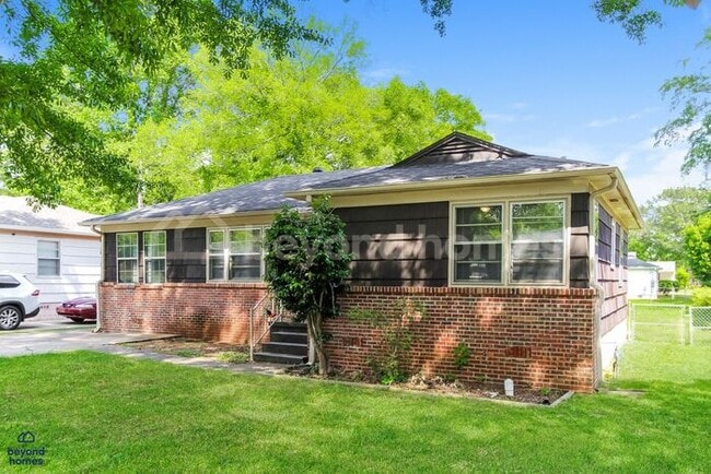 Building Photo - Updated Bungalow with Massive Deck and Fully Fenced Yard!