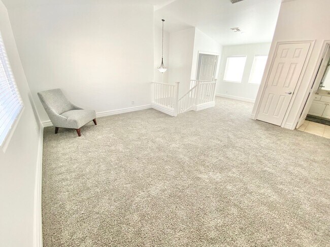 Building Photo - STUNNING 2 STORY HOME IN A GUARD GATED COM...
