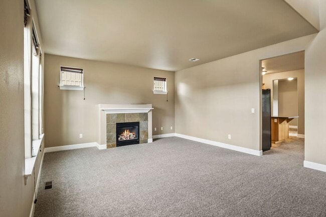 Building Photo - Spacious 4-Bedroom Home with New Paint & Carpet, Fenced Yard