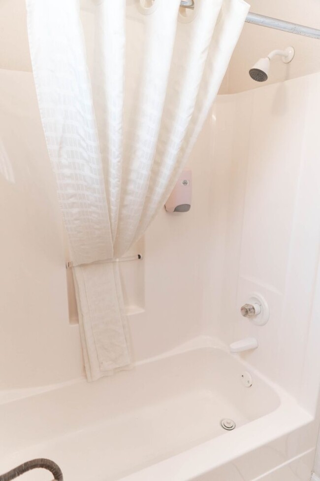 Building Photo - Stunning Beachfront 3-Bedroom Townhome!