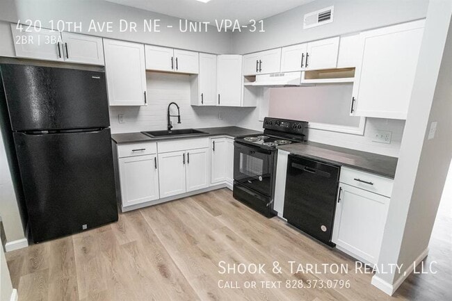 Building Photo - 420 10th Ave Dr NE