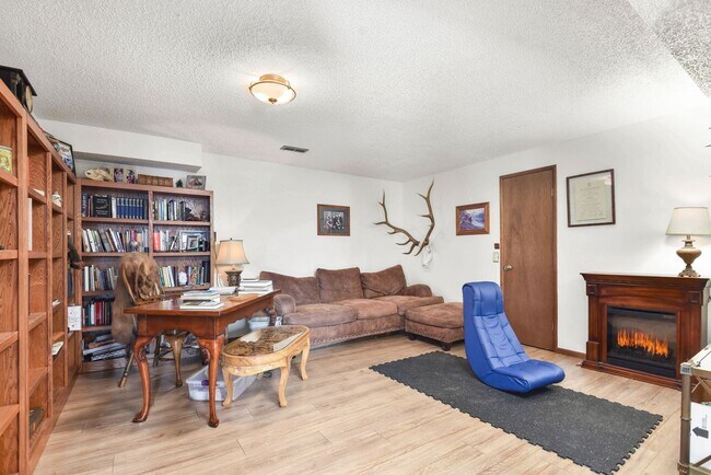 Building Photo - 2700 + sq ft family home has it all! Over 2 acres of land and a stunning view of Lake Pend Oreille