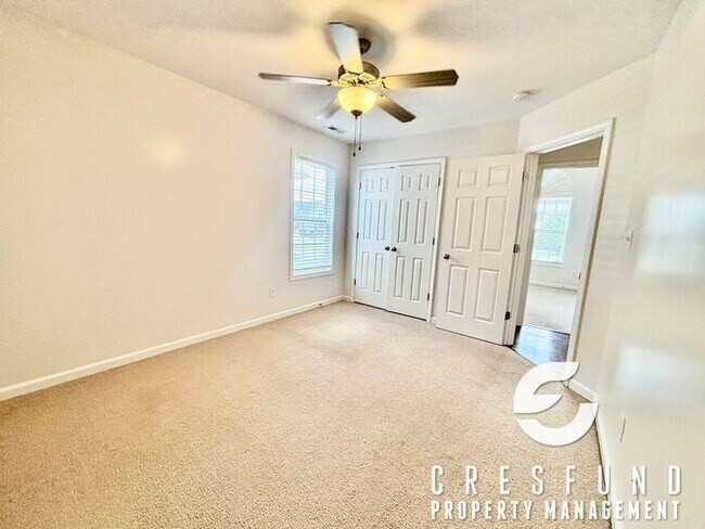 Building Photo - Freshly Painted and Spacious 4 Bedroom, 3 ...
