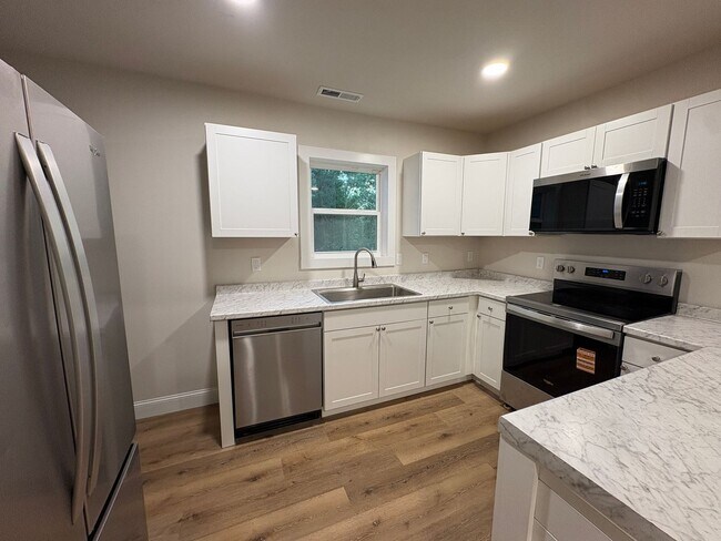 Building Photo - Modern Comfort & Convenient Living