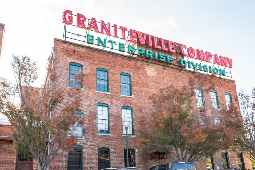 Neon Sign over Mill - Enterprise Mill Apartments