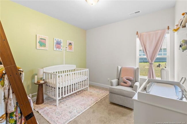 Building Photo - Charming 4-Bed home with Granite Touches & Cozy Fireplace in Sanford, NC!