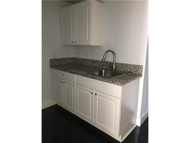 Building Photo - 120 NE 1st Ave