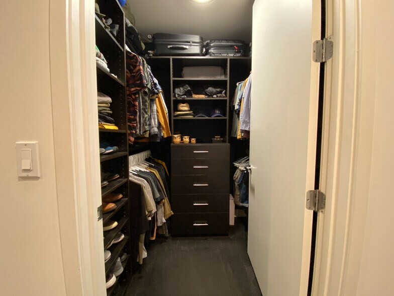 Primary walk in closet - 6001 Carlton Way