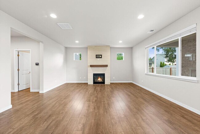 Building Photo - Modern 4-Bedroom Yelm Home with Covered Patio, Outdoor Fireplace & Office/Flex Space!