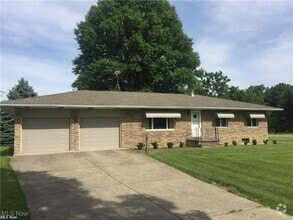 Building Photo - 10791 W River Rd