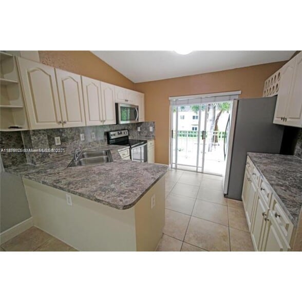 Building Photo - 10953 W Okeechobee Rd