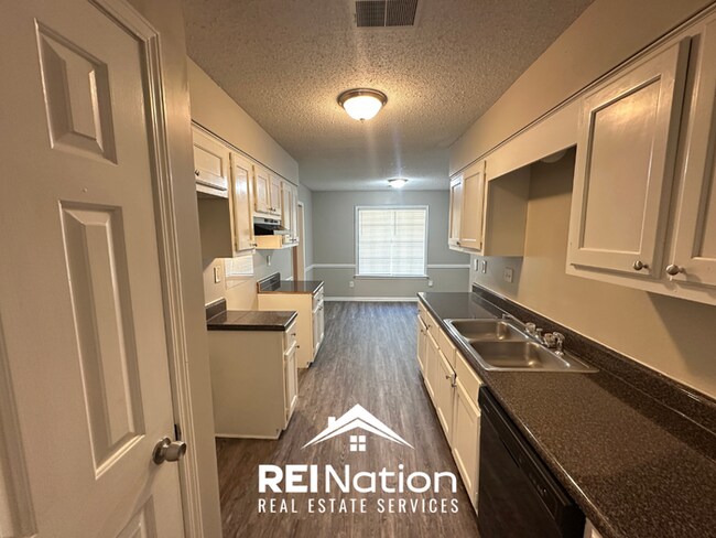 Building Photo - CORDOVA COVE CHARMER! 3BR/2BA | High Ceilings & Brick Fireplace | 2-Car Garage!