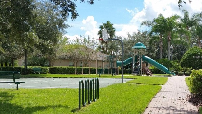 Building Photo - Beautifully Updated 4/3, Gated Community, ...