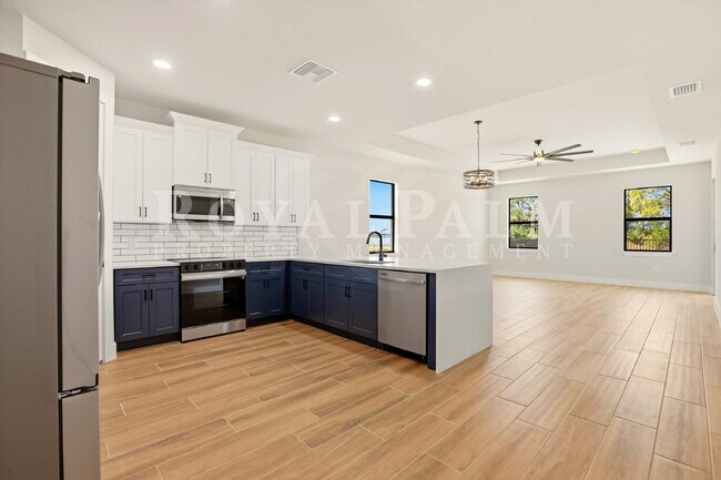 Building Photo - 3BR/2BA New Construction with Pool, Fence & Garage — Built Yesterday, Ready Today - Cape Coral