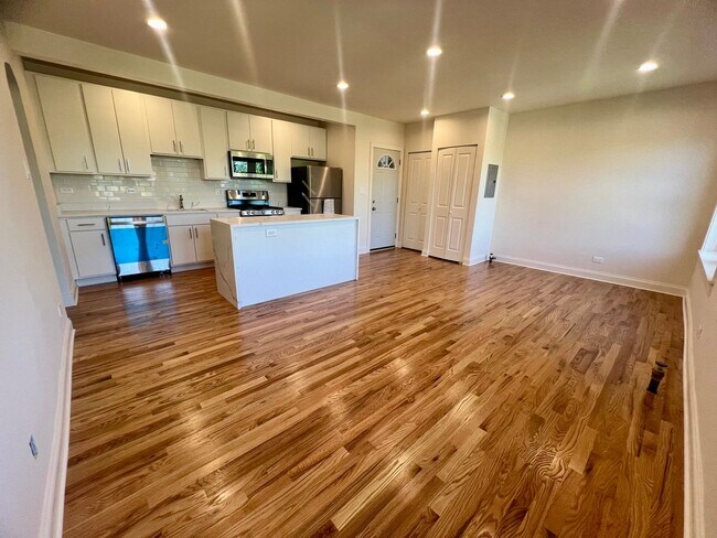 Building Photo - Brand New Renovation! 3 BR/ 2 BA On Quiet ...