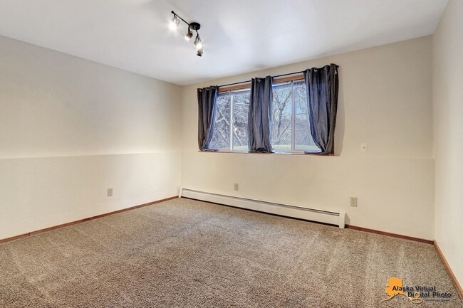 Building Photo - Spacious Home with Garage & Fenced Yard Near JBER & Major Hospitals