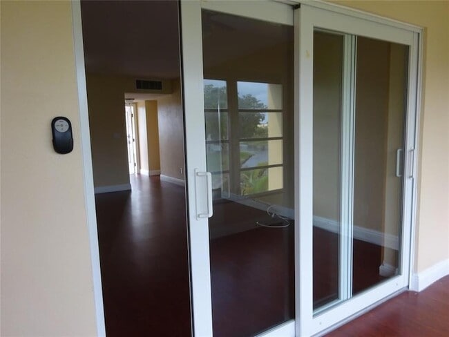 Building Photo - 6050 NW 64th Ave