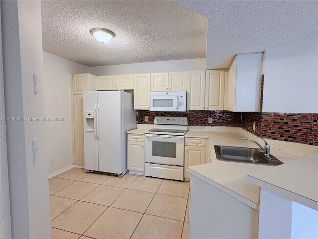 Building Photo - 9055 Wiles Rd