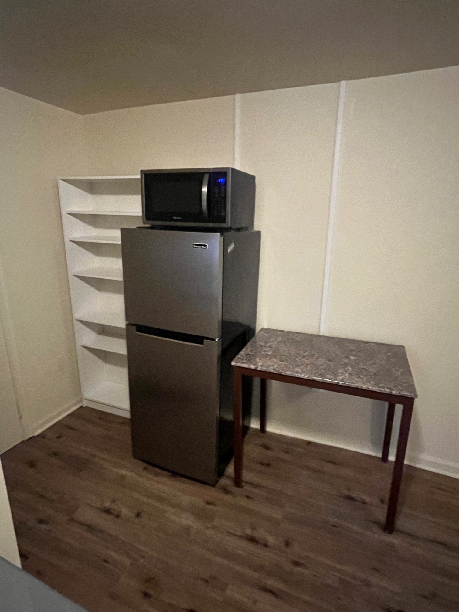 Fridge/freezer, microwave, & pantry shelves - 846 N Woodstock St