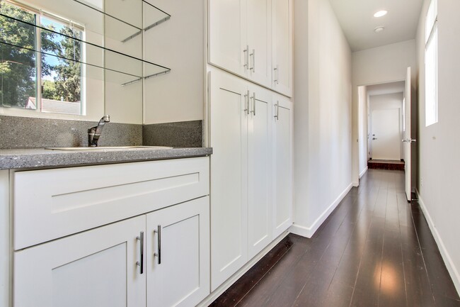 wet bar and cabinets in the hallway upstairs. - 8725 Lookout Mountain Ave