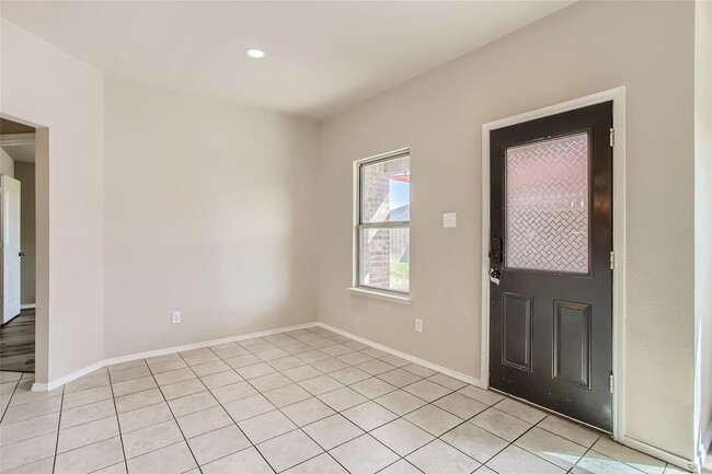 Building Photo - This well-maintained 4 bedroom home is located in a quiet neighborhood that has a community park ...
