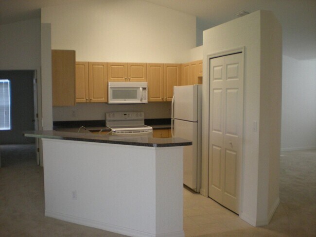 Building Photo - Freshly painted interior and BRAND NEW LVP...