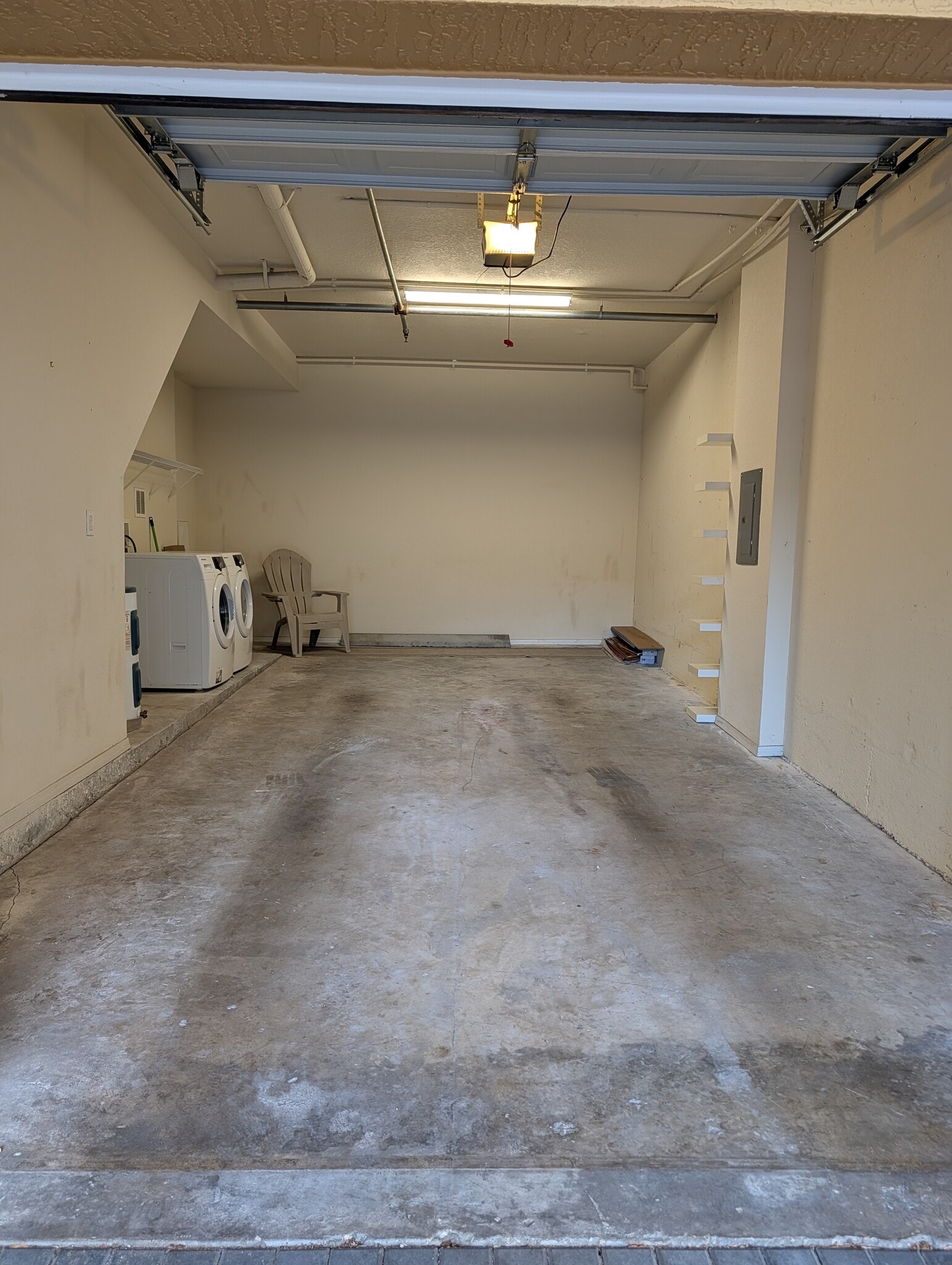 Garage with included washer/dryer and plenty of space for storage - 5218 Hampton Beach Pl
