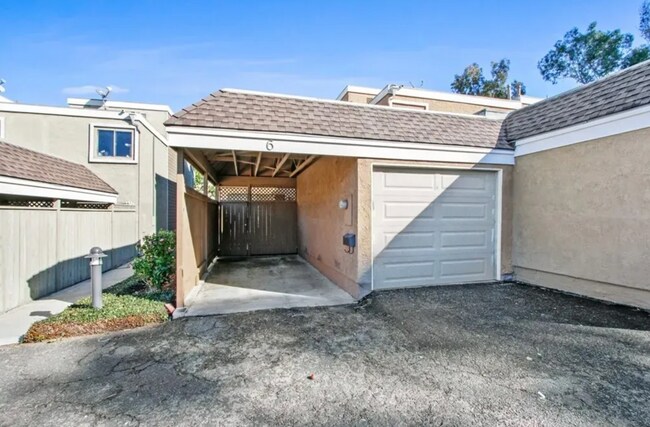 Building Photo - Stylish Coastal Condo in Newport Terrace –...