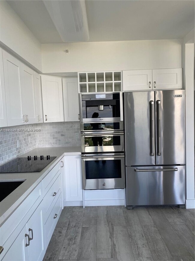 Building Photo - 4779 Collins Ave