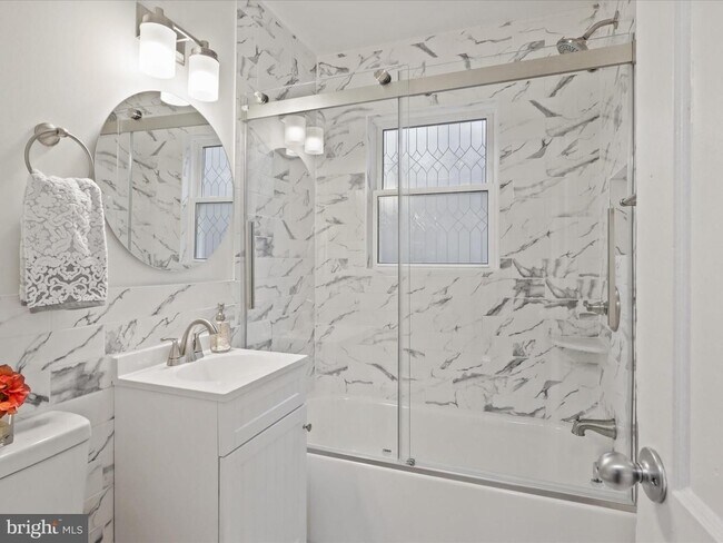 Building Photo - This home blends urban accessibility with peaceful natural surroundings.