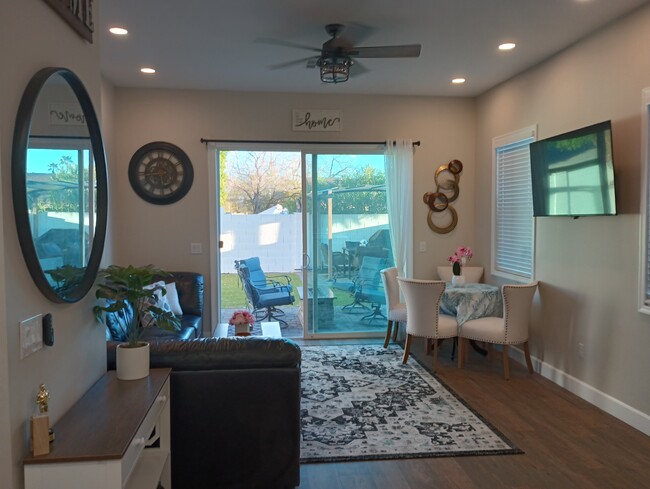 lovingroom and dining area - 8879 E Friess Dr