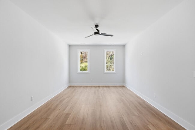 Building Photo - Bright, Open & Exceptionally Large—Your Ideal 2-Story Townhome