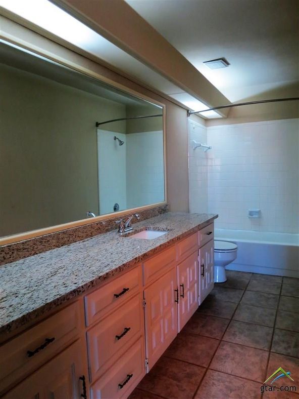 Building Photo - 5809 Hollytree-