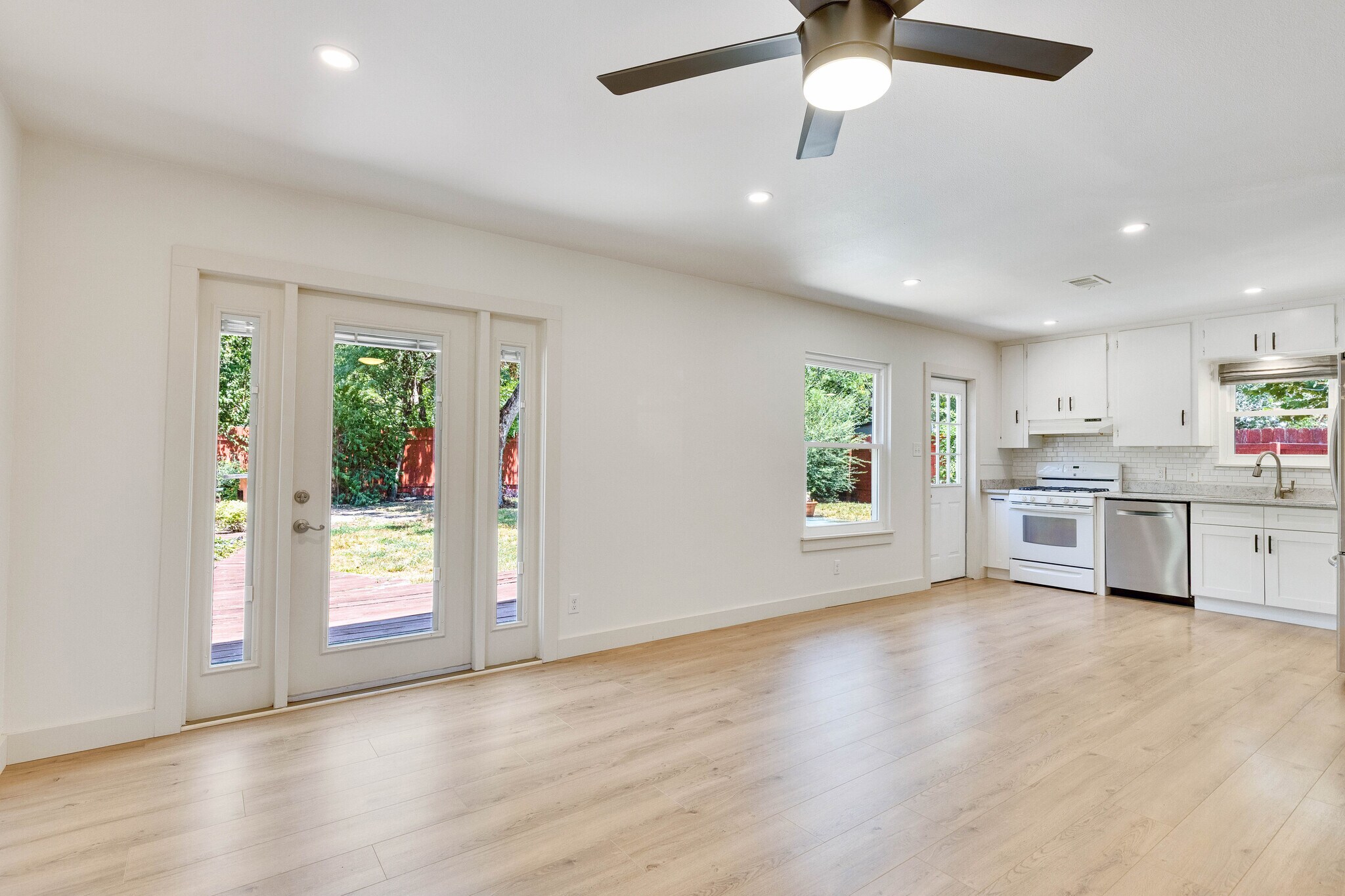 Vacant main room and dining area - 2102 Bristol Dr