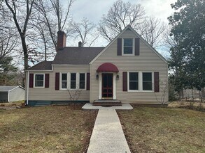 Building Photo - House in Bedford with Lot of Outdoor Space.
