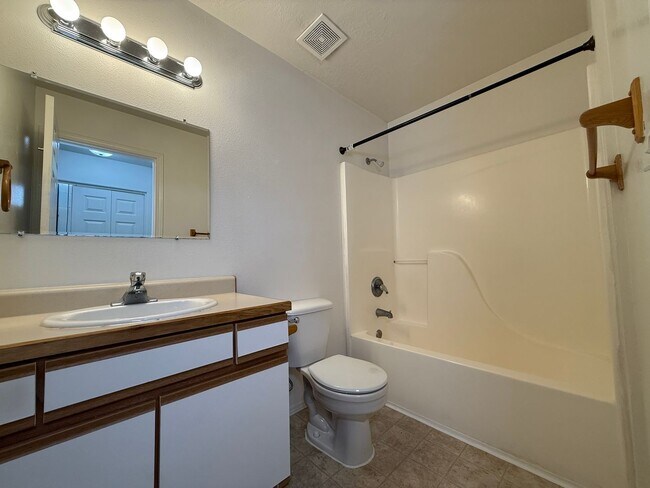 Building Photo - CHECK OUT THIS OPEN FLOOR PLAN HOME IN RED...