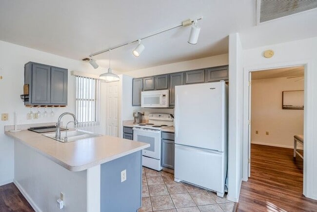 Building Photo - Turnkey Charm in Green Valley – Furnished Townhome with Gated Serenity!