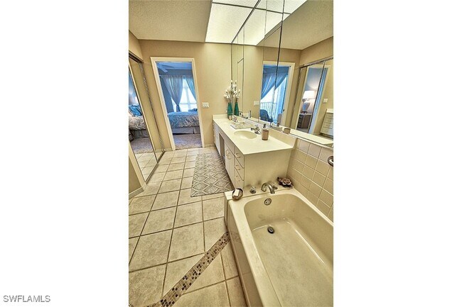 Building Photo - 265 Barefoot Beach Blvd