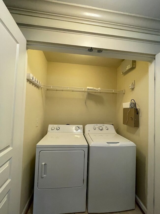 Building Photo - Two Bedrooms Available in this Three Bedroom Flat, Female Applicants!