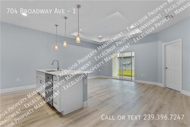 Building Photo - 704 Broadway Ave