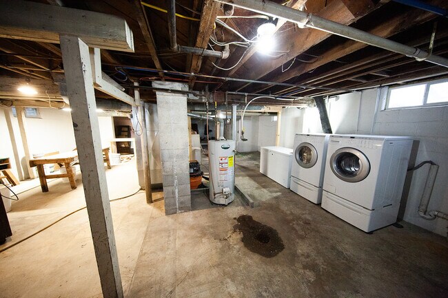 Basement with washer, dryer & storage (chest freezer not included) - 820 N Washington Ave