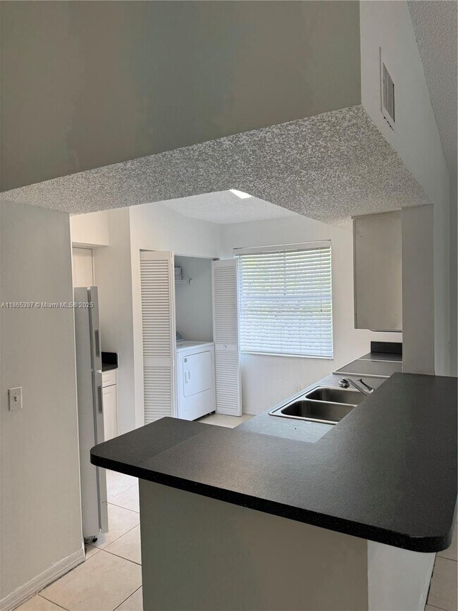 Building Photo - $2,400MONTHLY;9615 NW 1ST CT #10-301 PEMBR...