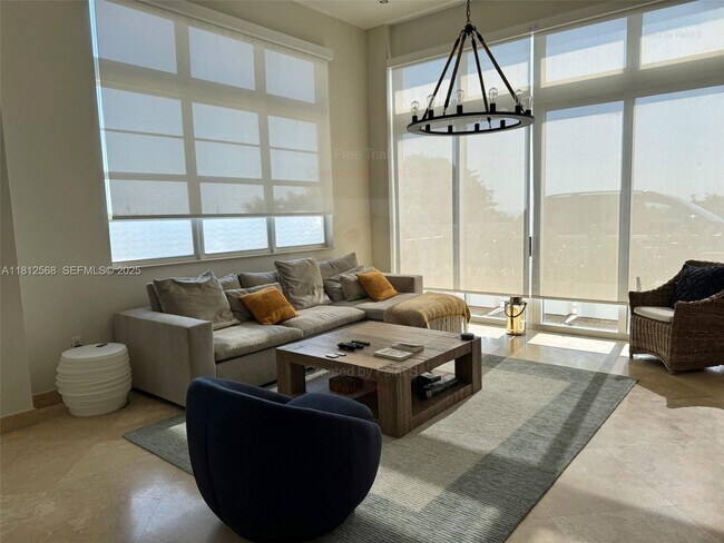 Building Photo - 6917 Collins Ave