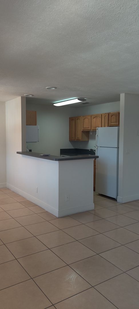 Building Photo - Newport Condominiums - 201