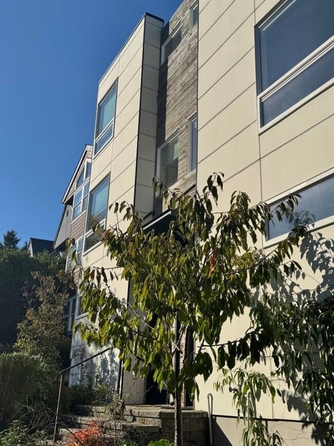 Building Photo - Elevate your living experience with this i...