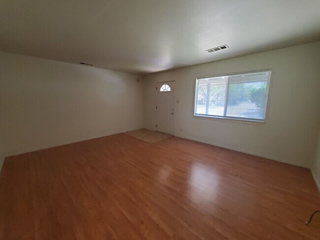 Building Photo - Price Reduced! 3 Bedroom 2 Bath House with Large Yard Available Now!